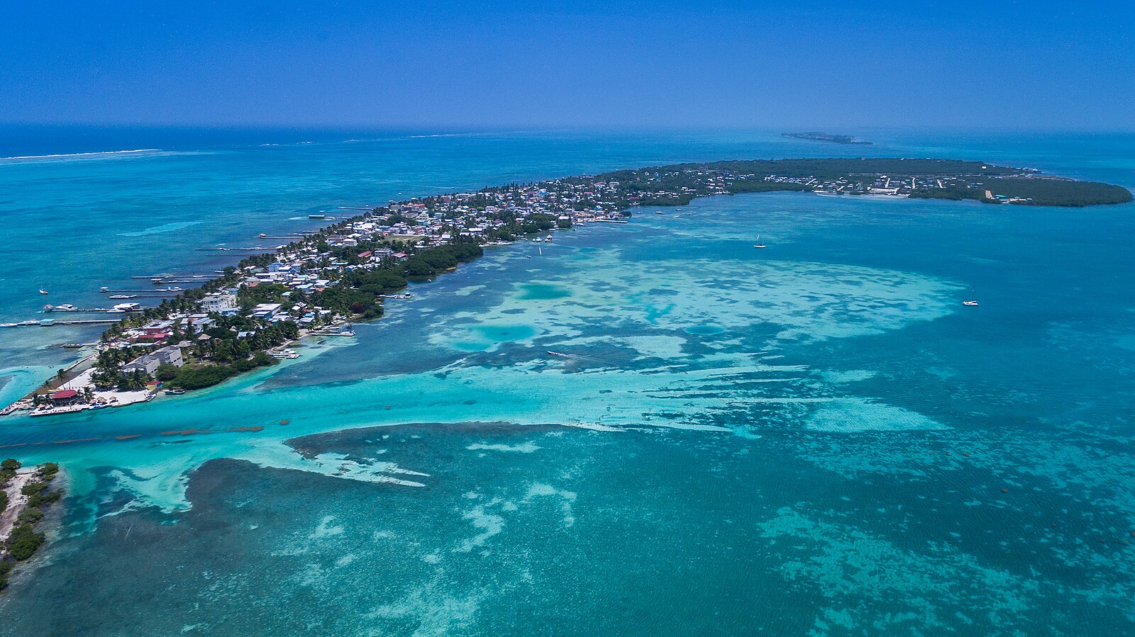 Aerial view of Caye Caulker island and turquoise Caribbean waters, Belize
