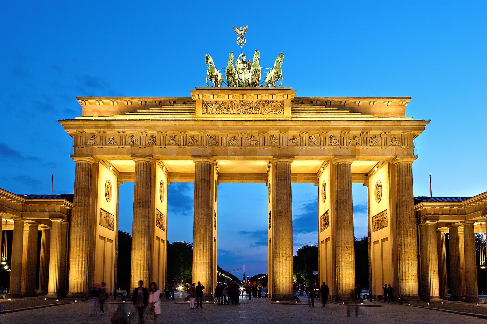 Brandenburg Gate in Berlin, Germany, illuminated at blue hour twilight