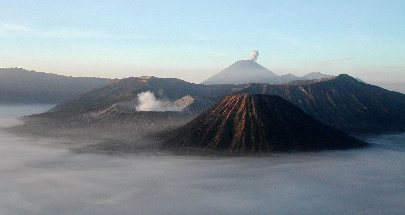 Mount Bromo volcano at sunrise with Mount Semeru in the background, East Java, Indonesia