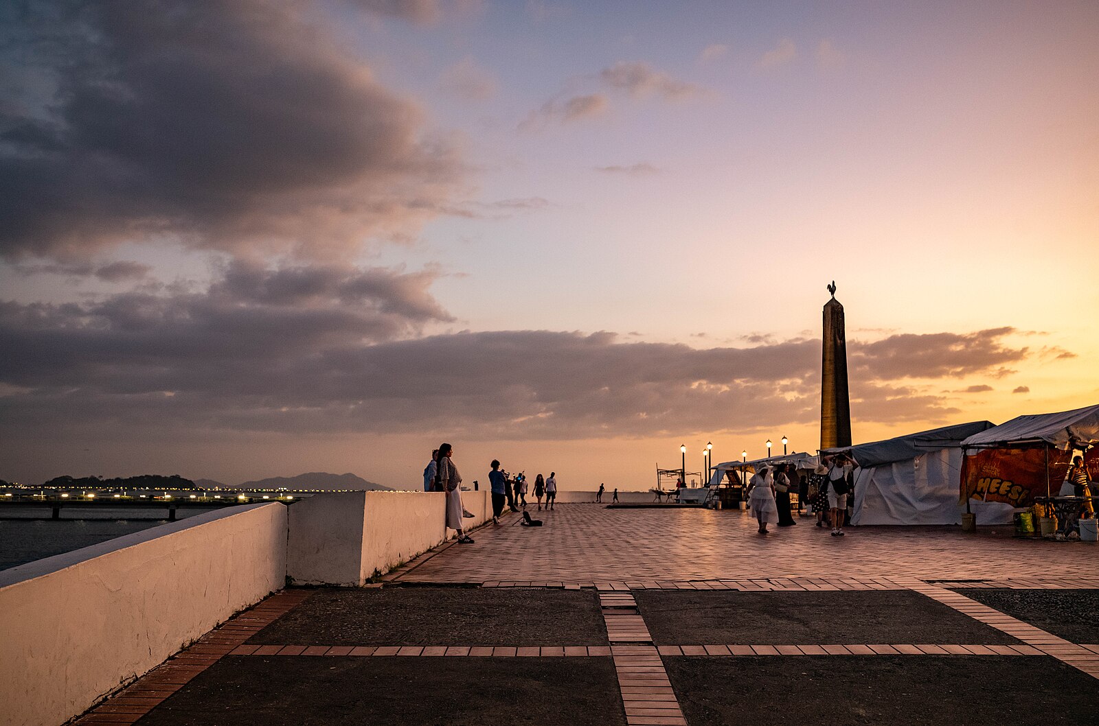 Casco Viejo historic district at dusk with modern Panama City skyline